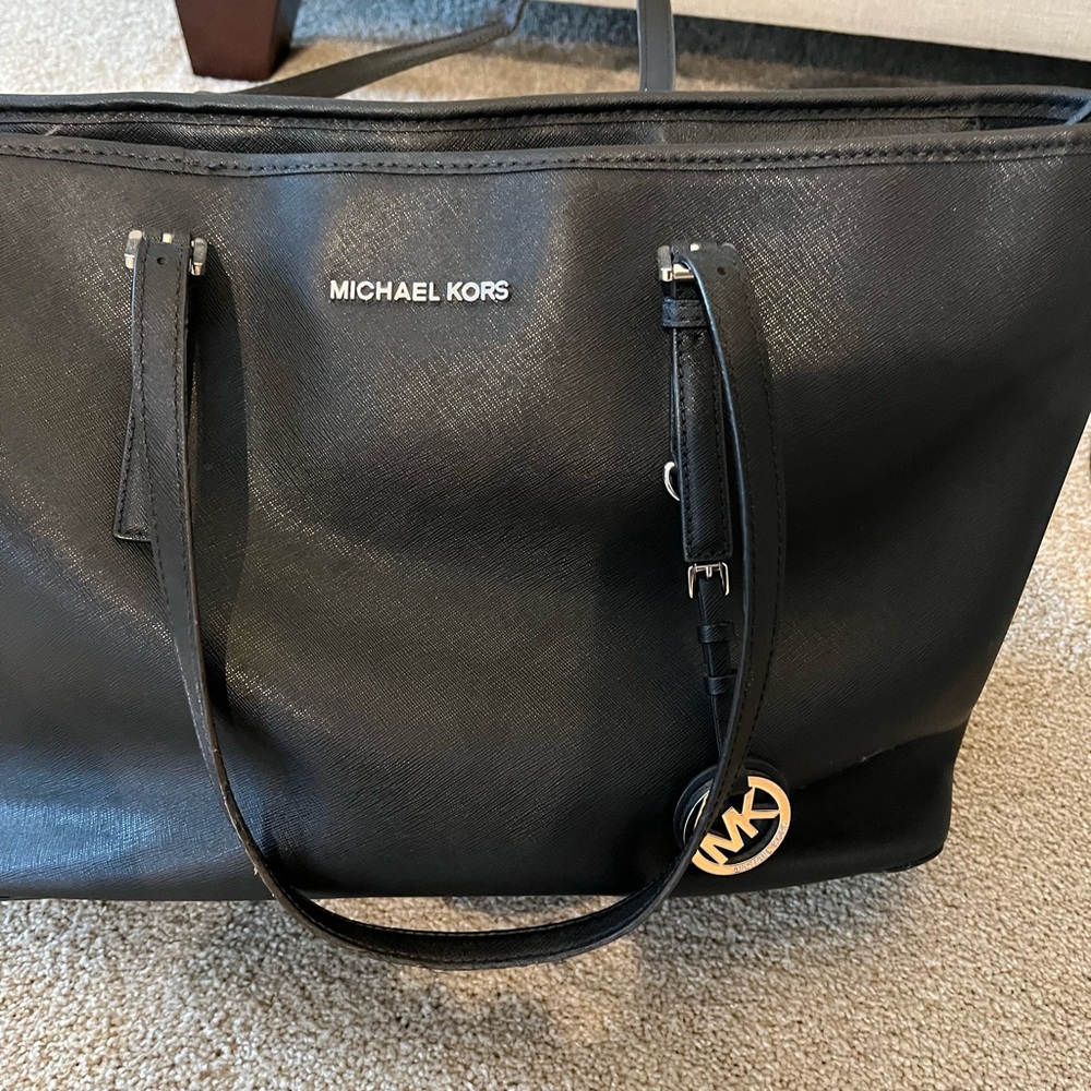 Michael Kors Tote Bag. Handles are fraying